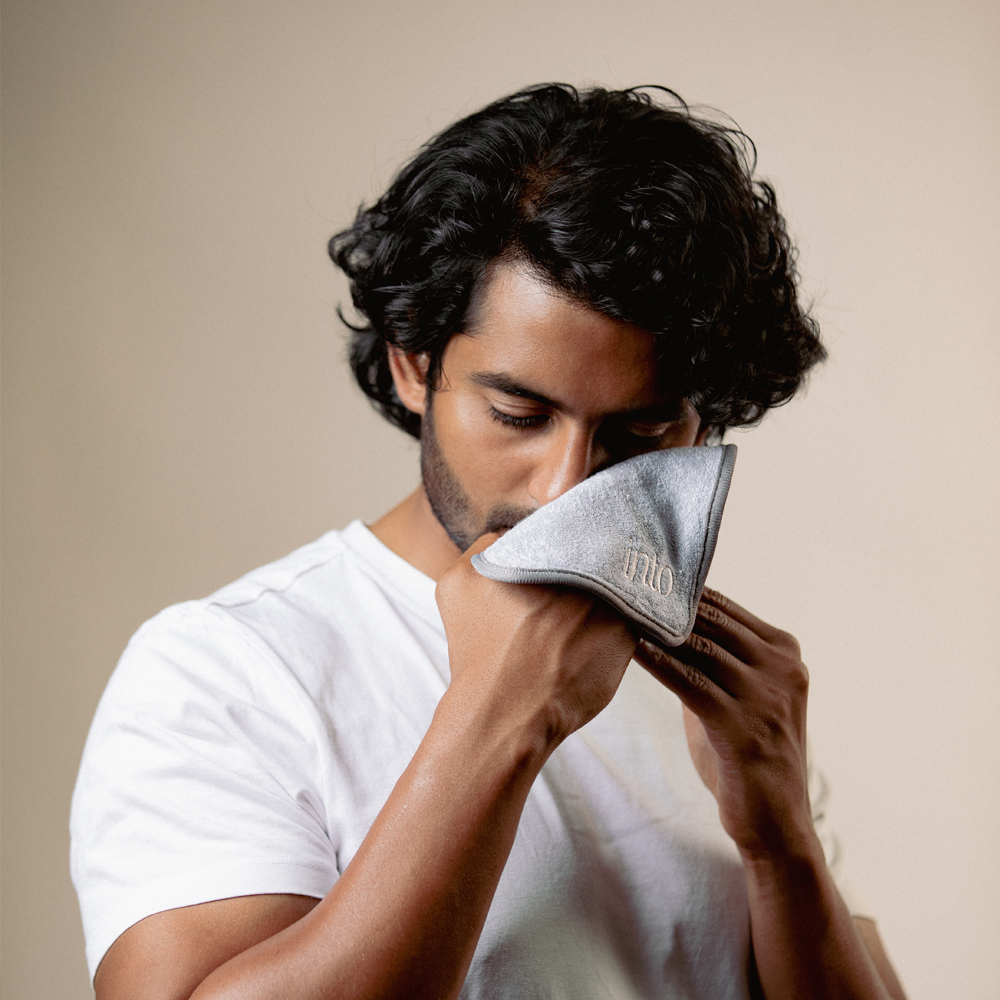 Male Model wiping face with face towel